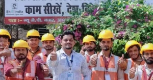 Trainees in safety helmets and vests with an instructor at Al-Hind Technical Training Center, Ballia